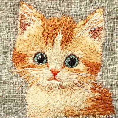 Süßes Kätzchen im Stickereistil
